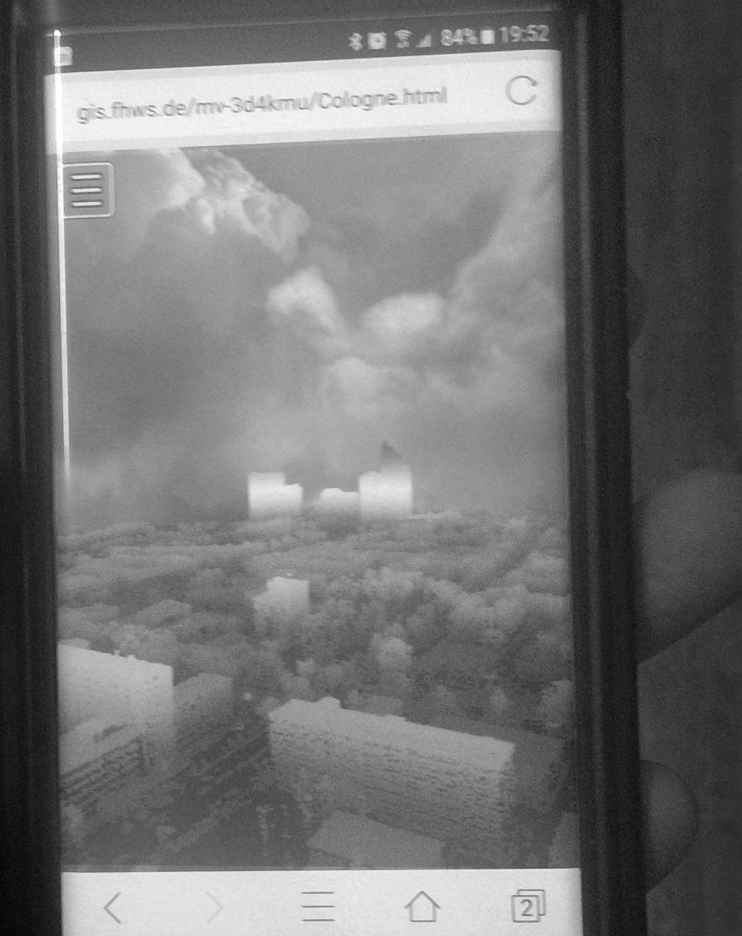Abbildung 2: Im Bild wird die Anwendung Potree auf dem Handy ausgeführt. In der Anwendung werden Punktwolken der Stadt Köln nach Höhe eingefärbt, dargestellt. Das dient der einfacheren Erkennbarkeit der räumlichen Struktur der vielen Punkte.